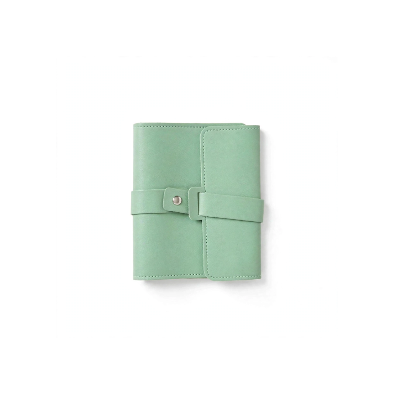 Inside view of green jewelry organizer with studs earrings holder and storage
