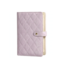 Purple quilted jewelry travel book organizer closed view with snap button for necklace storage