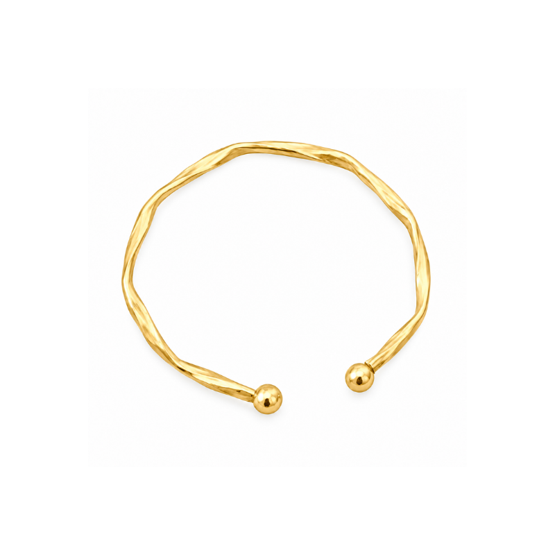 Golden open-end bracelet with two round decorative beads