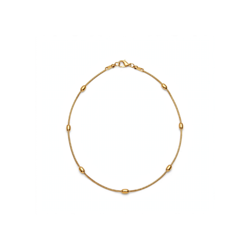 Delicate gold-tone snake chain bracelet featuring evenly spaced smooth oval bead stations and a lobster clasp, arranged in a circle on a white background.